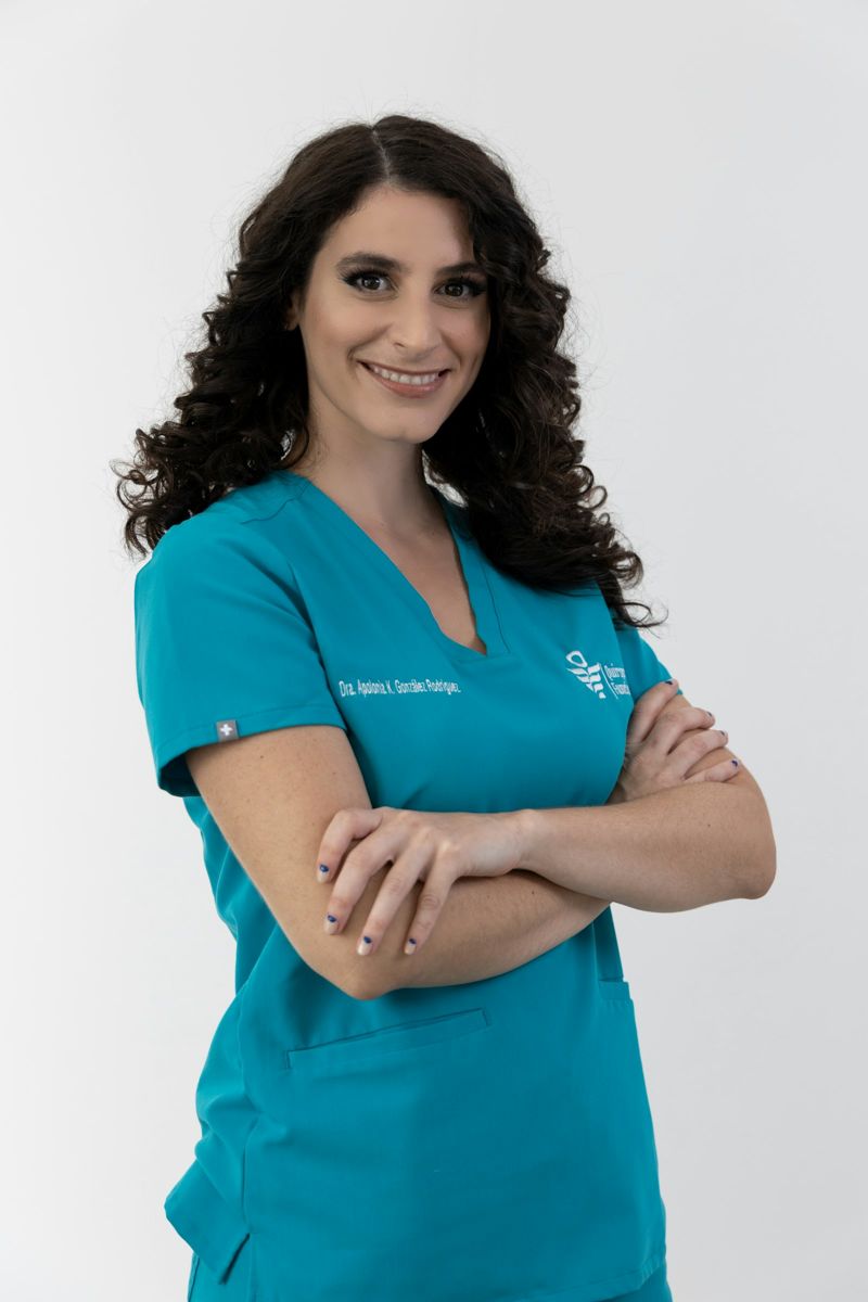 A smiling nurse in uniform ready to help